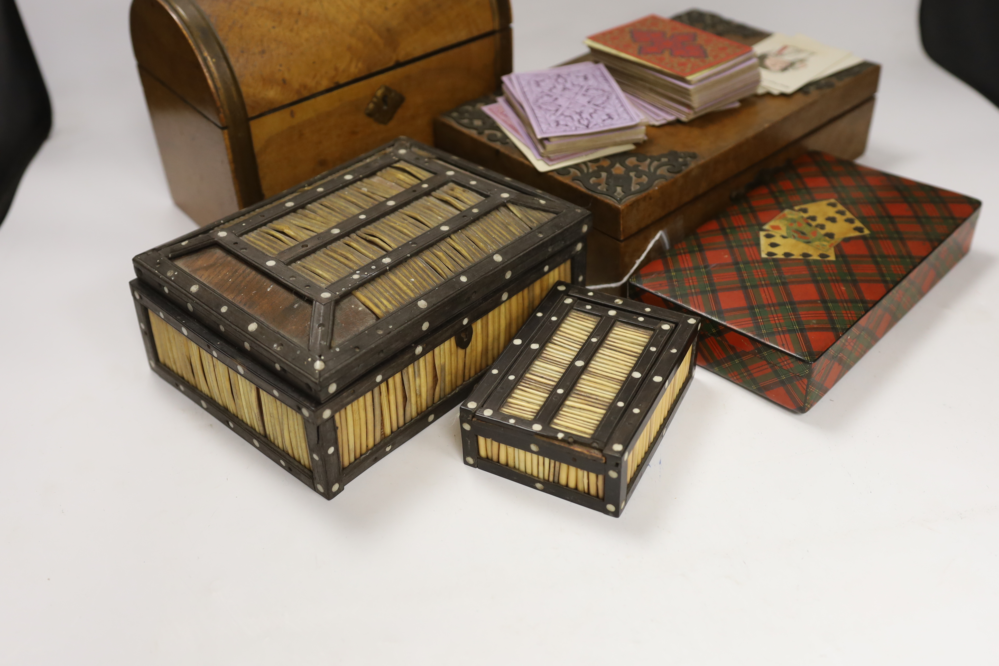A Tartanware games case, a burr walnut compendium, a dome topped stationery box and two quill boxes, largest 22cm wide x 17cm high